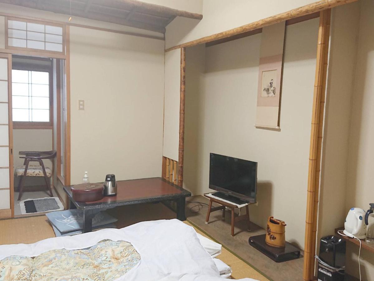Kagetsu Ryokan مايزورو الغرفة الصورة